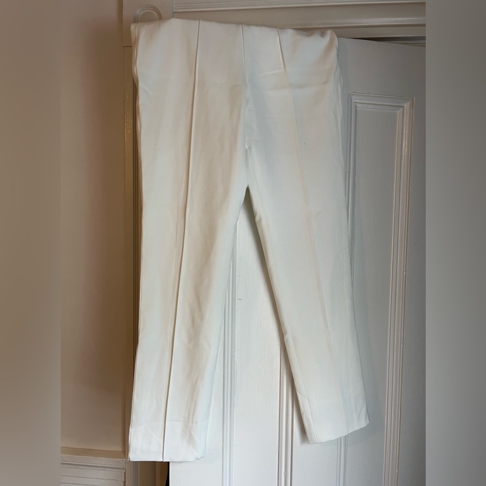 Because of Alice (boa) high waisted white trousers, size small.
